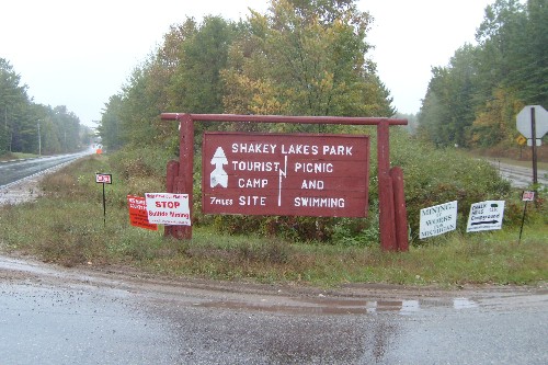 Signage enroute to Shakey Lakes near where the Aquila open mine is opening, speak to the different viewpoints that have caused hard feelings.
